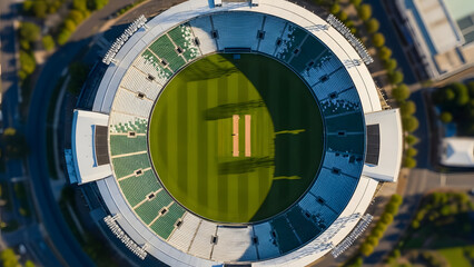 Top-down aerial view of a large cricket stadium
