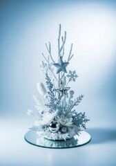 Elegant winter wonderland baby shower centerpiece with snowy white and silver decorative accents and frosted textures, gathering, ribbon, expectant