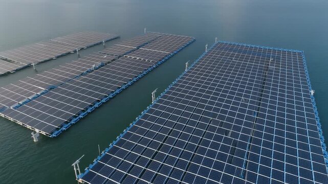 Aerial view of floating solar panels on water, harnessing clean renewable energy and supporting a sustainable future
