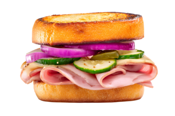 Sandwich with ham, pickles, and onions on toasted bread served as a quick lunch option in a casual setting