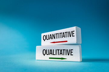 Quantitative or qualitative choice.  Quantity vs quality. Business concept. Red and green arrows...