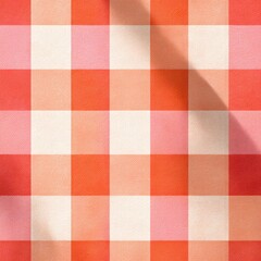 Red and white checkered fabric with subtle shadows creating soft folds