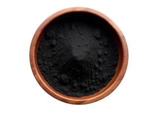 A bowl containing black powder on a white surface