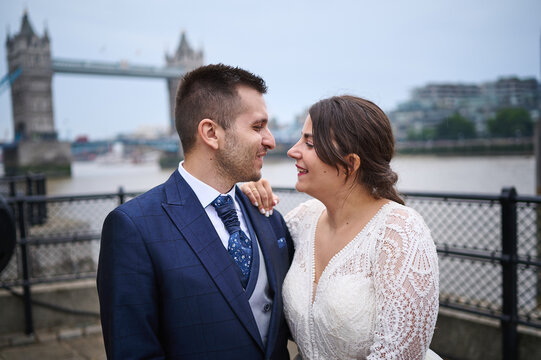 Romantic post-wedding photo in iconic London setting