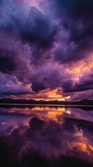 Dramatic Purple Sunset Sky Reflected on Calm Lake Water