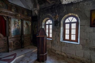 Dim Orthodox Cave Church with Arched Windows