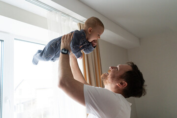 Loving father enjoying precious moments with his baby