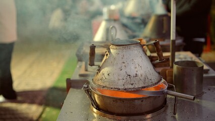 Cozy street market illuminated by warm glow and fragrant culinary creations