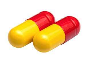 Two red-and-yellow capsules, close-up