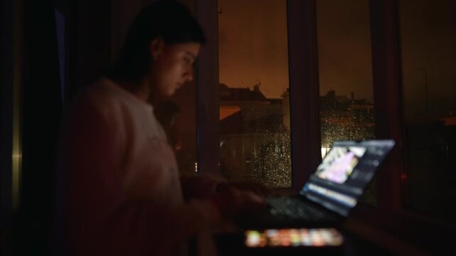 Nighttime creative practice with city lights in private studio