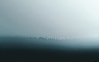 Misty forest silhouette fades into a bright, diffuse, overcast sky