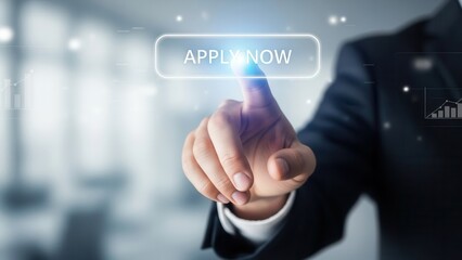 Closeup Businessman Hand pointing at virtual Apply Now button, concept of online job application, career opportunity, recruitment portal, and digital hiring process