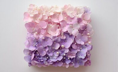 Delicate floral art piece.  Soft pinks and purples, hydrangeas and pearls