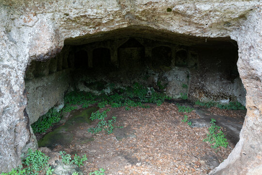 Italy - Sutri - Necropolis of Sutri - Semi circular hypogeum with niches and altar hollow carved in soft tufa