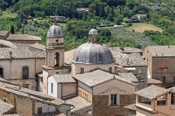 Italy - Orvieto - Church of Santi Apostoli - Dome and bell tower over medieval lanes and tiled roofs in the historic quarter © Guillaume