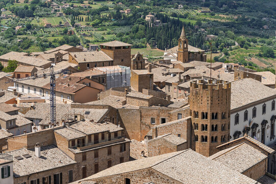  Italy - Orvieto - Church of Sant Andrea - Decagonal bell tower above tiled rooftops