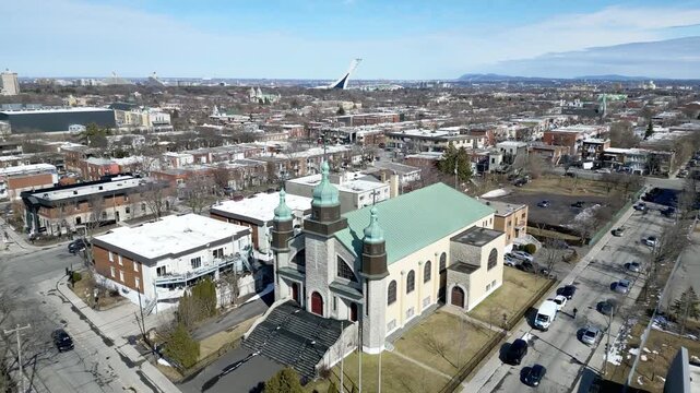 Aerial view of Assumption of the Blessed Virgin Mary Catholic Church in Montreal on a clear winter day. g.