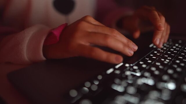 Studying softly in evening glow while practicing keyboard skills