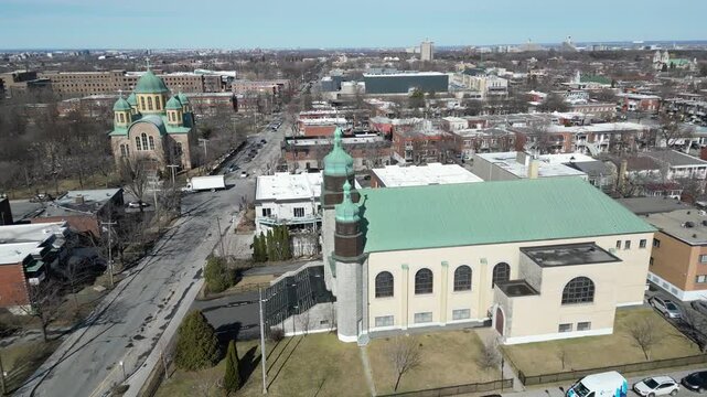 Aerial view of Assumption of the Blessed Virgin Mary Catholic Church in Montreal on a clear winter day. g.