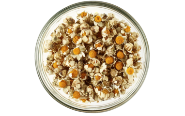 High quality dried chamomile in decorative bowl perfect for brewing tea, skincare, and home spa treatments isolated on transparent background PNG