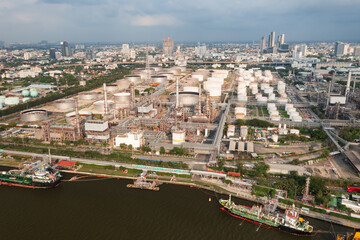 Obraz premium Bang Chak Oil Refinery is located along Chaopraya rivier in Bangkok Thailand. Aerial view from a drone.