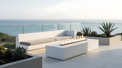Obraz premium Modern White Outdoor Living Space with Fireplace and Ocean View.