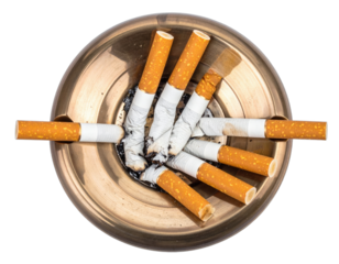 Close-up of a brass ashtray overflowing with extinguished and unlit cigarettes