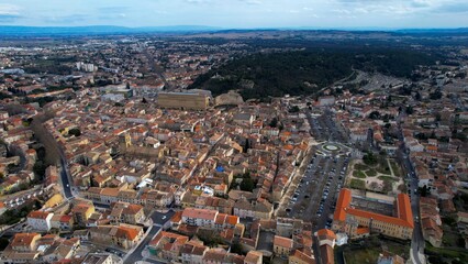 Aerial panoramic view around the old town of the city Orange France on a sunny day in early spring.