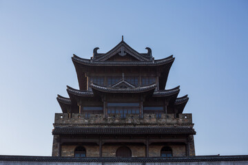 Fototapeta premium Close-up of the Chinese-style ancient architecture tower in Yanguan Ancient City, Jiaxing, China