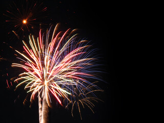Fireworks display, fire work show for new year celebration. multi-color display of beautiful lights. 