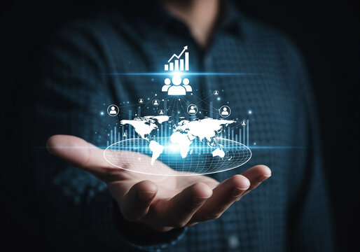 Businessman hand holding human icon for customer value and customer relation management concept. - Powered by Adobe