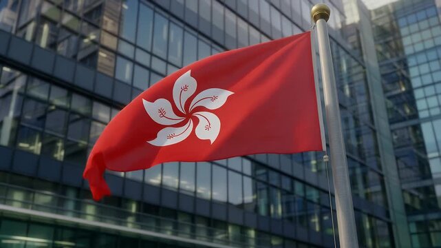 Hong Kong flag waving in front of modern office building