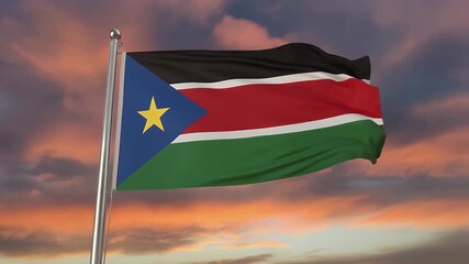South Sudan flag waving in the wind at sunset