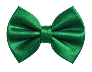 Close-up of a vibrant green satin bow tie against a black background
