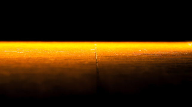 gamestop. A thin golden light from a crack in dark wood, suggesting hidden space. travel magazines, destination branding, designed for travel destination branding, used by product managers.