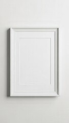 Minimalist White Frame on Light Gray Wall.