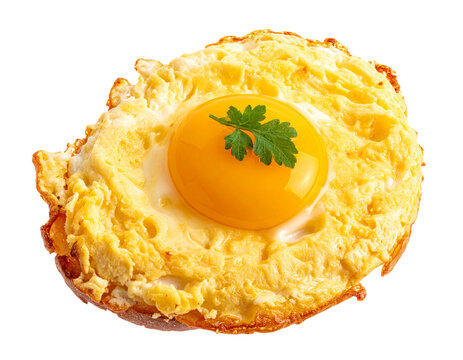 A perfectly fried egg with a bright yellow yolk and a sprig of parsley on top isolated on a white background.