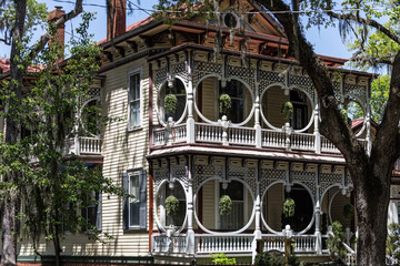 Savannah's Gingerbread House Inn: ornate Victorian architecture, Spanish moss.
