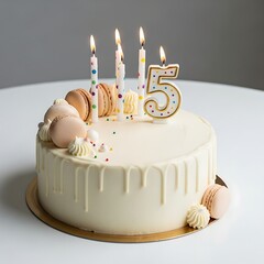 Minimalist 5th birthday cake with white chocolate drip and candles