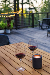 Romantic Evening on a Deck with Wine and Candlelight