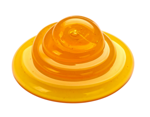 Viscous orange liquid swirling in concentric circles.