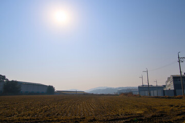 The appearance of a countryside on a foggy autumn day