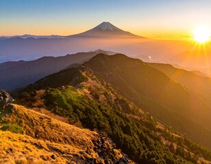 Majestic mountain range at sunrise with prominent snow-capped peak