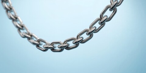 Obraz premium Strong Steel Metal Chain Links Isolated on Light Blue Background