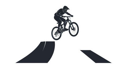 Mountain biker performing a jump on a downhill bike silhouette style. © Roti