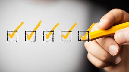 A hand marking multiple checkboxes to represent task verification, progress tracking and organized workflow management.
