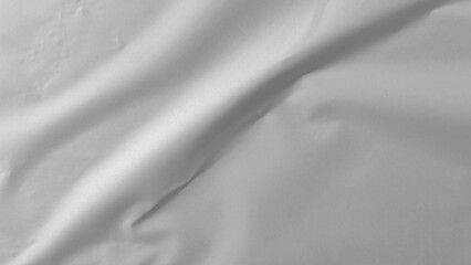 Fototapeta premium Glued paper texture. Crumpled and wrinkled surface of plain black paper poster background. Wrinkled wet paper