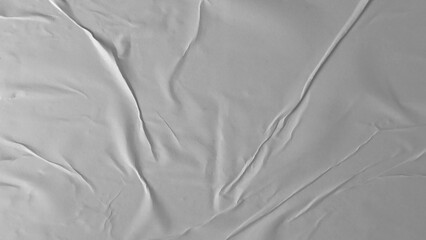 Glued paper texture. Crumpled and wrinkled surface of plain black paper poster background. Wrinkled...