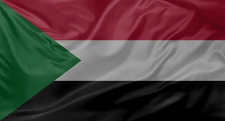 Gordijnen Bordeaux National flag of Sudan waving for design on independence or republic day  © firewings