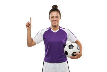 Female Soccer Player in Purple Jersey Pointing Up with Soccer Ball